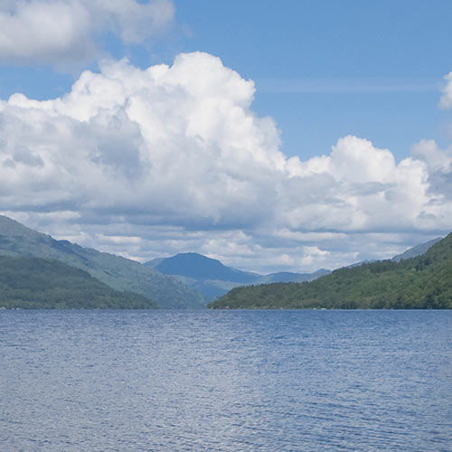 Loch Lomond with blue sky and clouds